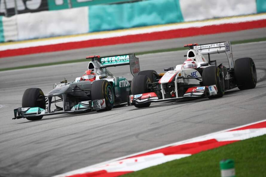 Kobayashi-Schumacher-GP-Malaysia-2011-Formel-1-c890x594-ffffff-C-4bec847e-474636.jpg