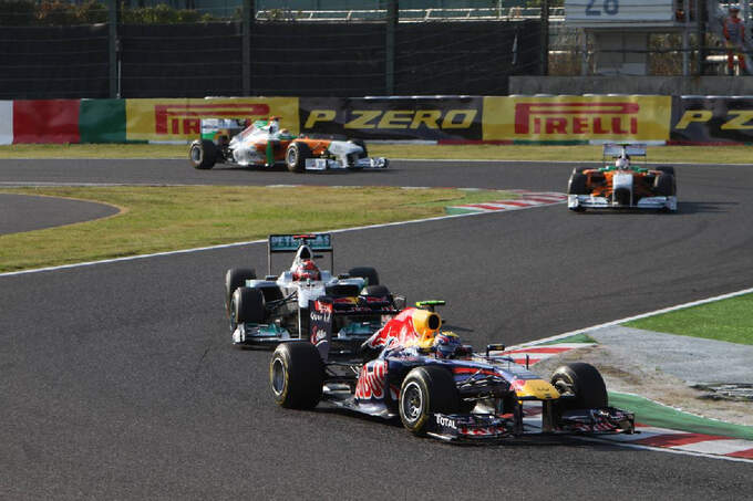 Mark-Webber-Michael-Schumacher-Formel-1-GP-Japan-9-Oktober-2011-fotoshowImage-47cfc8b9-542489.jpg