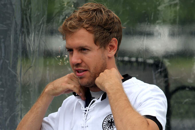 Sebastian-Vettel-Red-Bull-Formel-1-GP-Kanada-Montreal-5-Juni-2014-fotoshowImage-85d1e3f9-784003.jpg